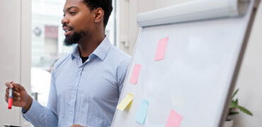 businessman-presenting-his-project-colleagues