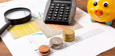 front-view-piggy-bank-stationery-items