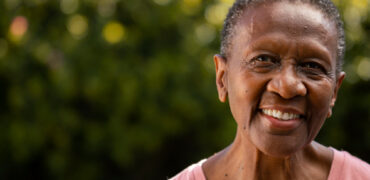 front-view-smiley-black-woman